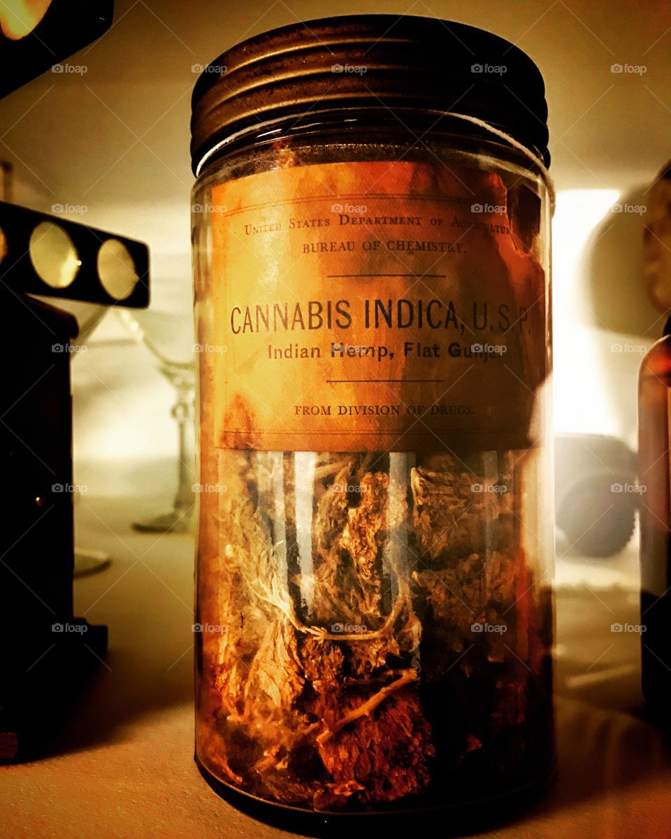 A gorgeous close upaged antique jar of canabis indica marijauna. Alternative medicine 