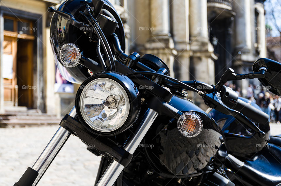 Black classic motorcycle on the street