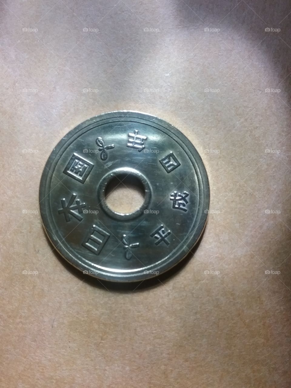 Japanese coin, 5 Yen, with new script. It was first minted in 1959. It is 1 of my coins collection.