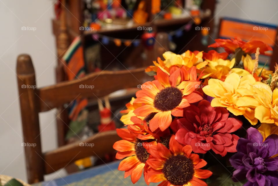 Mexican table. Brilliantly colored flowers adorn this Mexican table. 