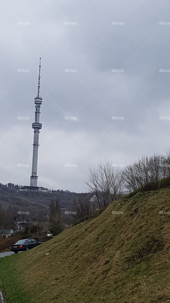 koktobe tower against drammatic sky