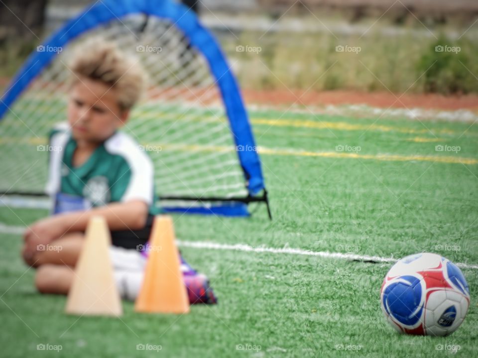 Youth Soccer. Tired Young Soccer Player
