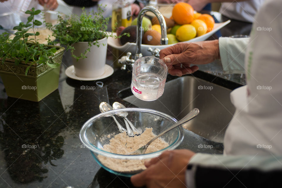 Baking in the kitchen making scones with natural organic ingredients 