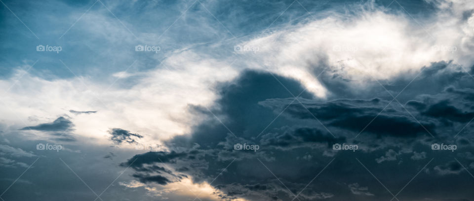 Detailed clouds during sunset at the beach