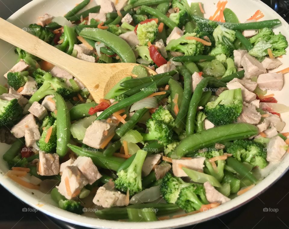 Stir fry being cooked 