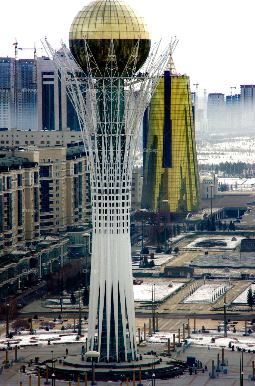 Exterior daylight.  Astana, Kazakhstan.  The Bayterek, a structure expressing national myths and pride.  