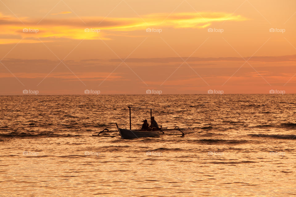 Fishing at sunset