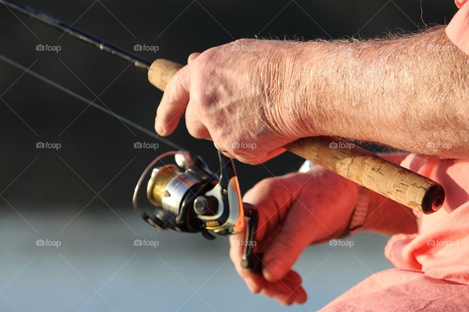 Daddy's hands while fishing