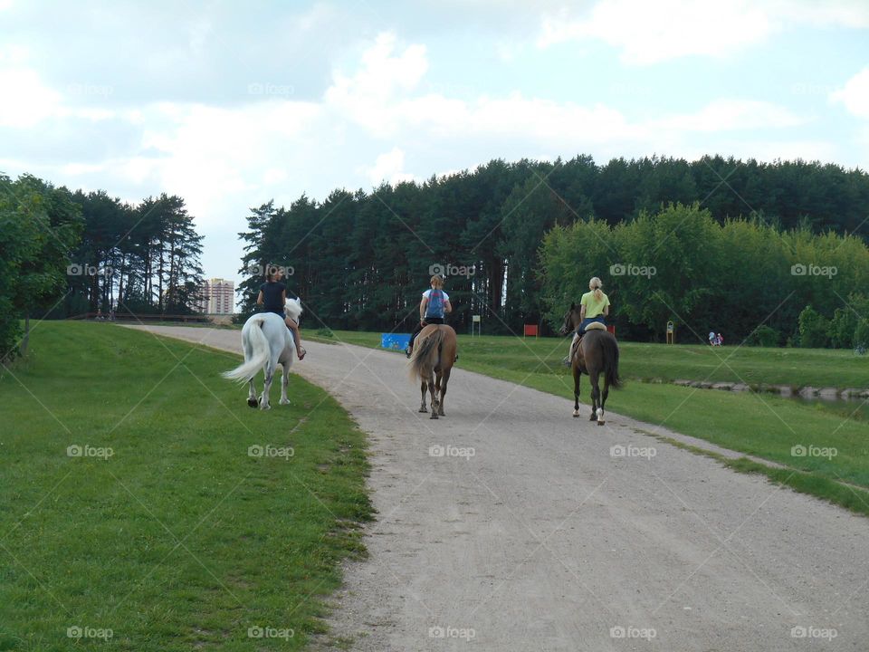 people on w horses summer time