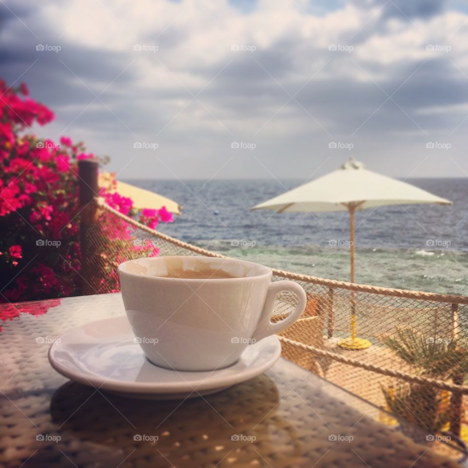 Coffee cup at beach