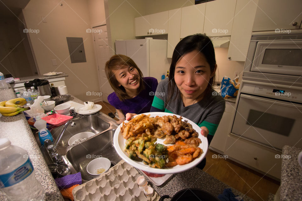 Girl in the kitchen with food