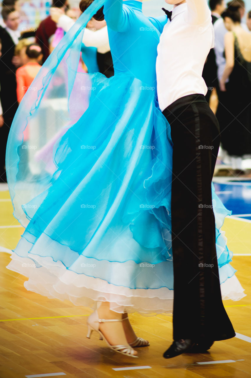 Boy and girl dancing in their wardrobe costumes