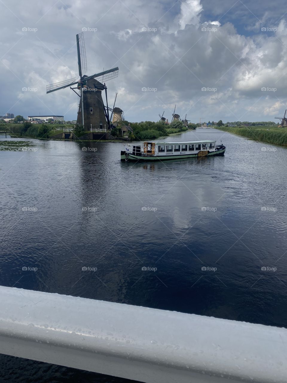 Boat wind windy river Kinderdijk the Netherlands View