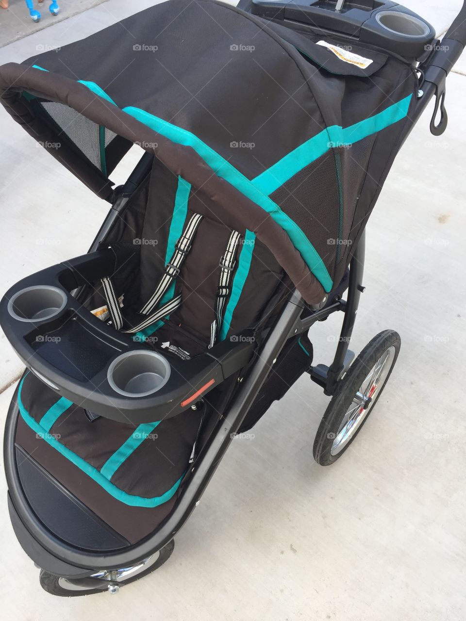 Black and teal baby jogging stroller 