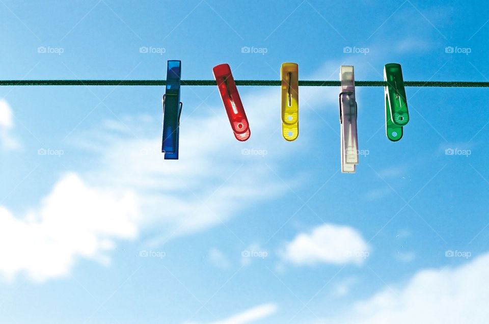 Warm, blue sky on summer. The sun makes the clothes dry.