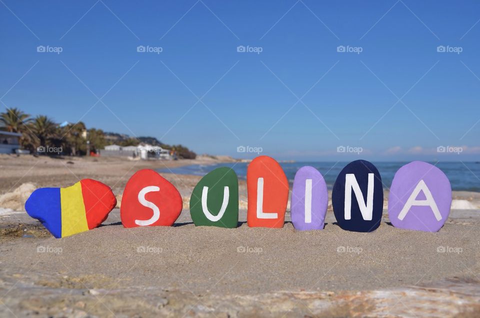 Sulina, souvenir on stones with national romanian colours