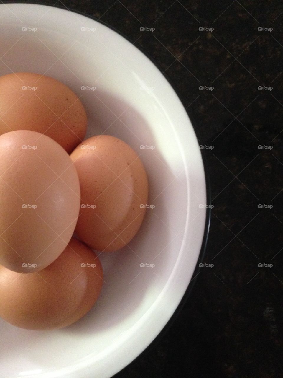 Brown eggs in a bowl