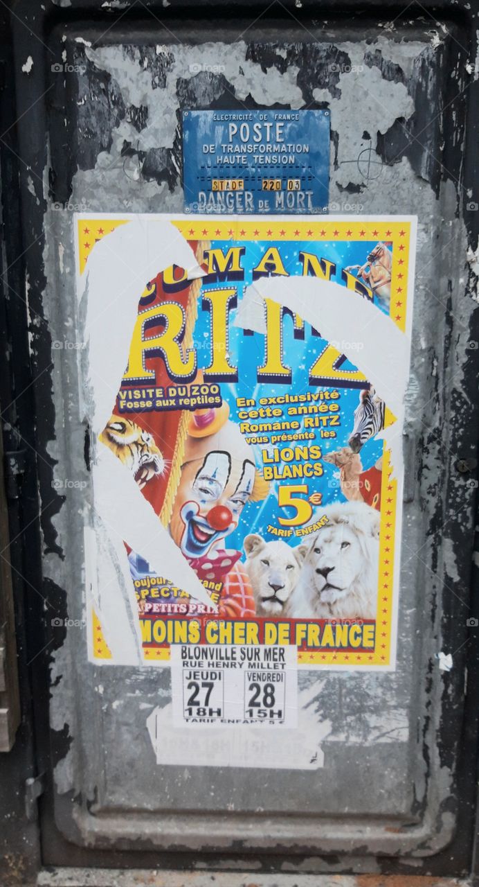 torn poster of Ritz circus in Indeauville