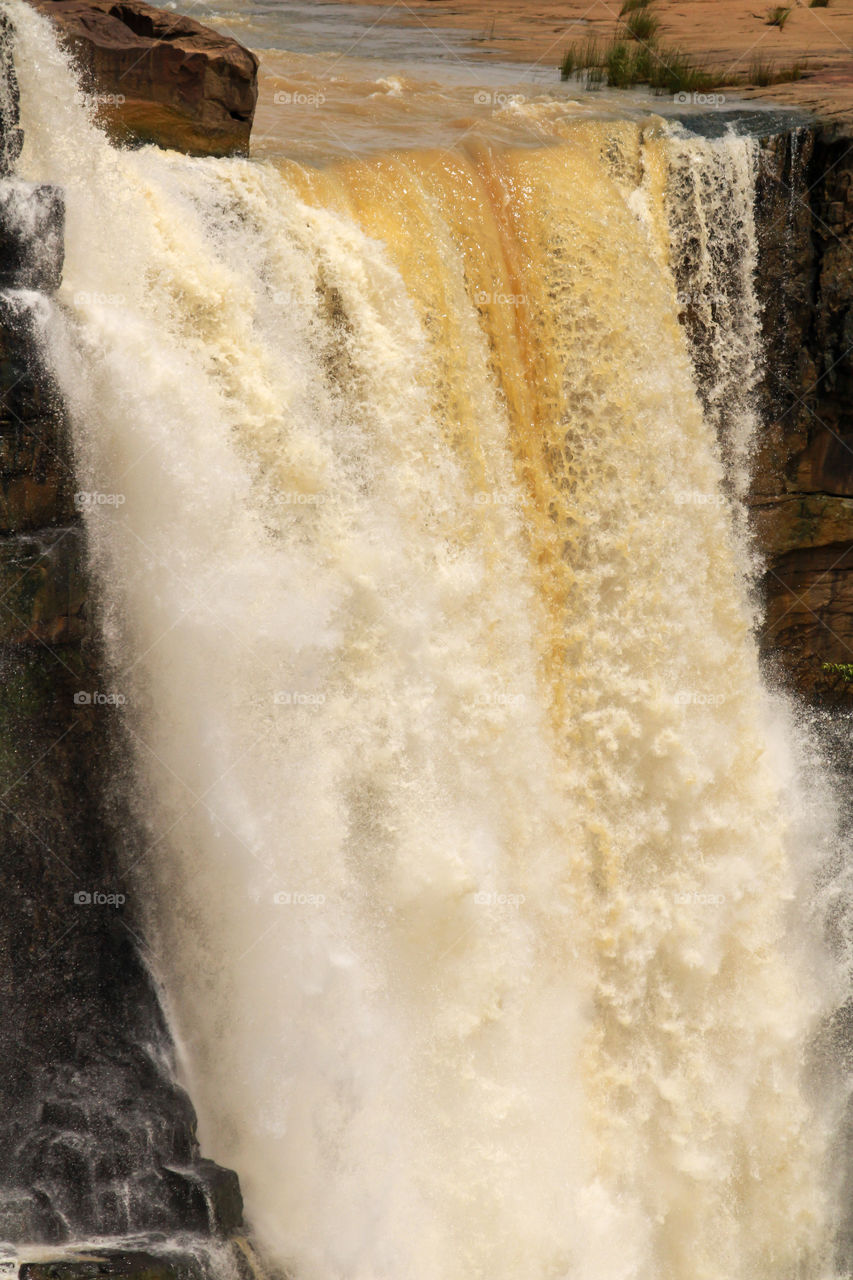 Waterfall with the mixture of mud