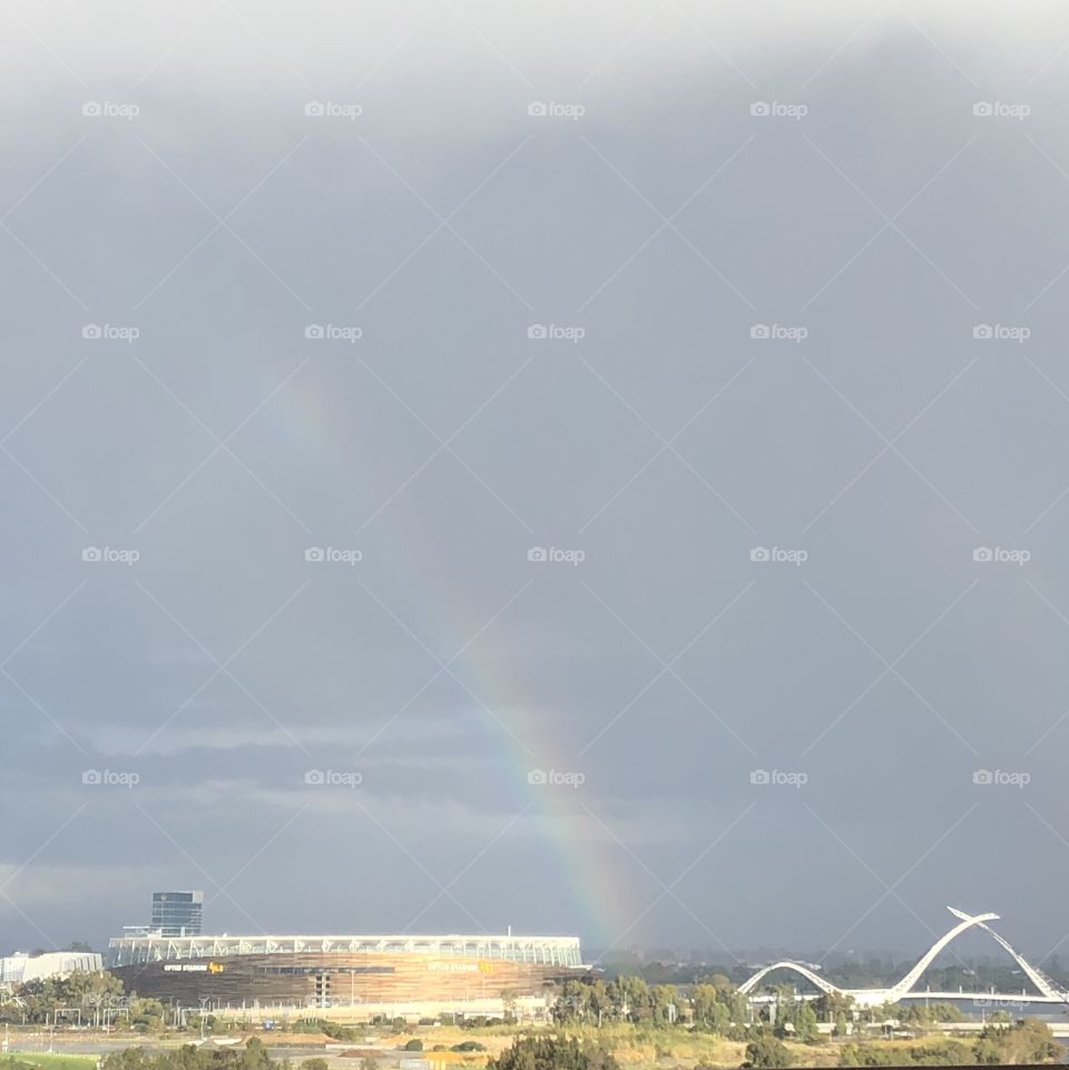 Optus Stadium with rainbow 