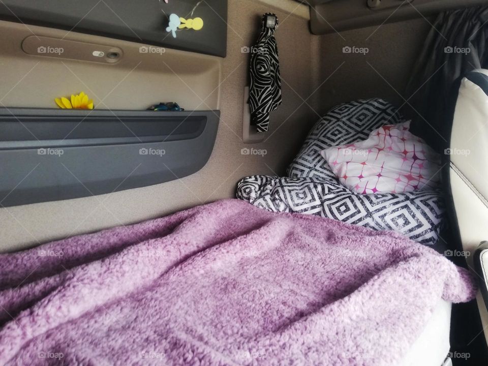 Made bed in the truck.