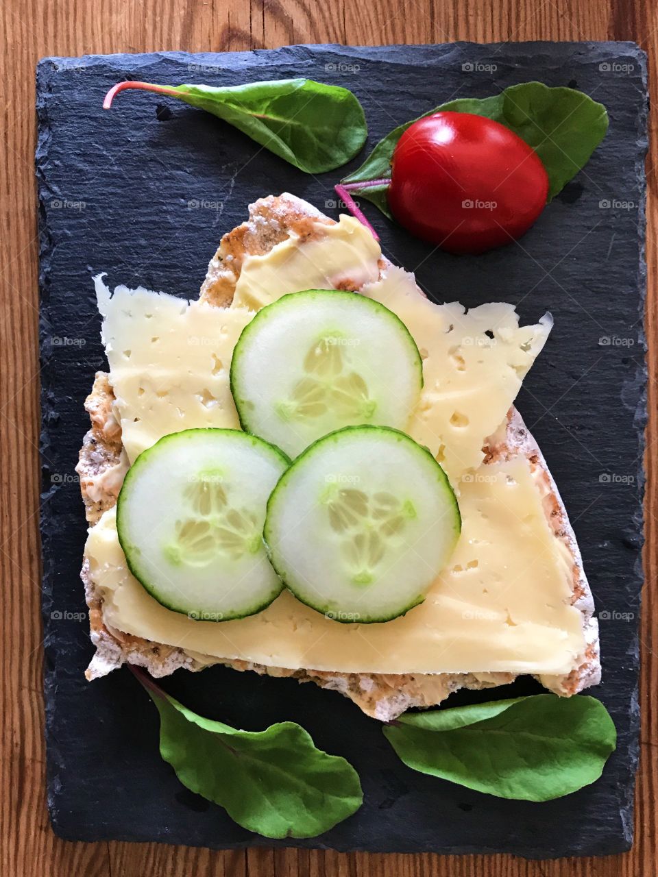 Bread snack with cheese and vegetables