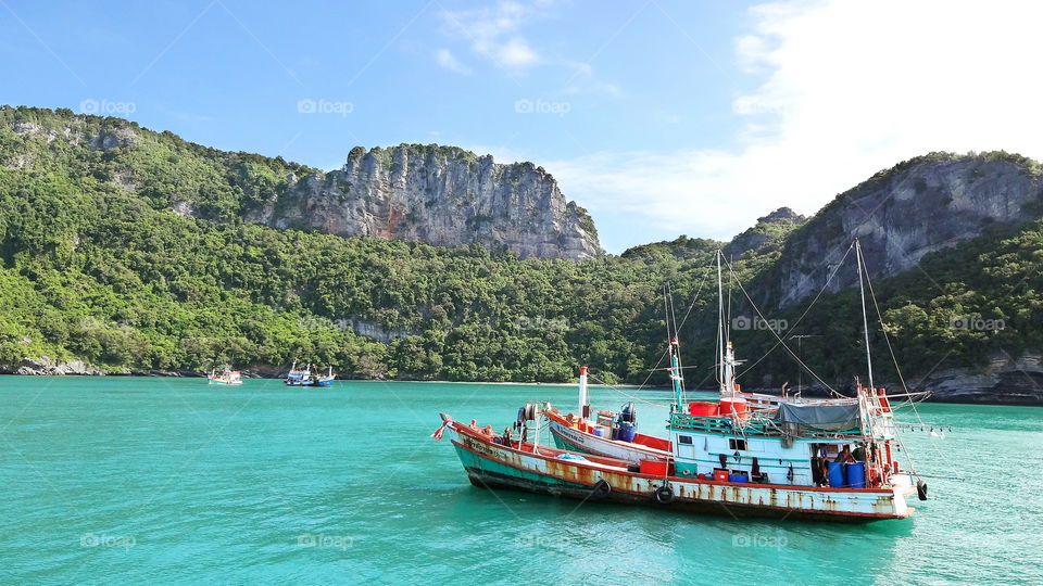 Colorful thai fishing boats in colorful water, koh samui thailand