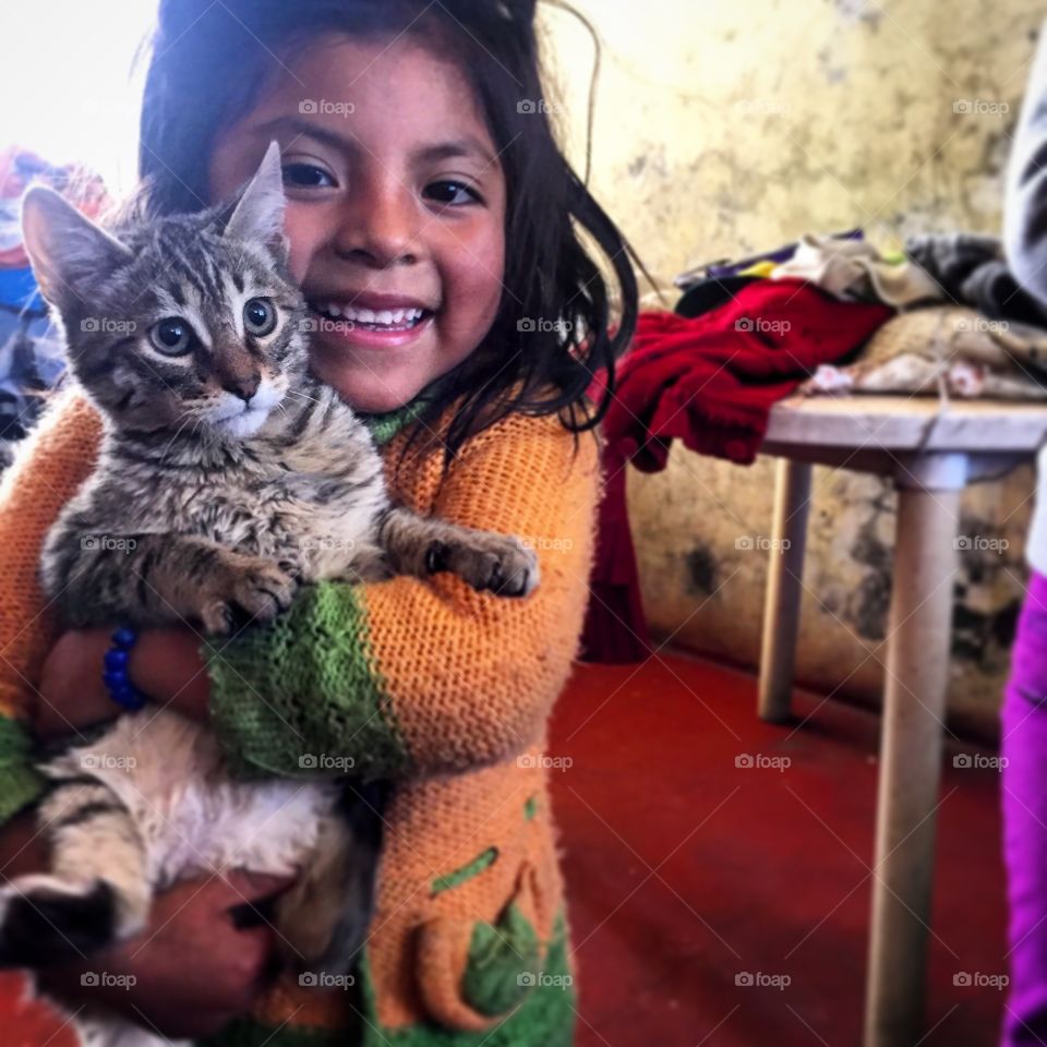 Little girl holding her best friend