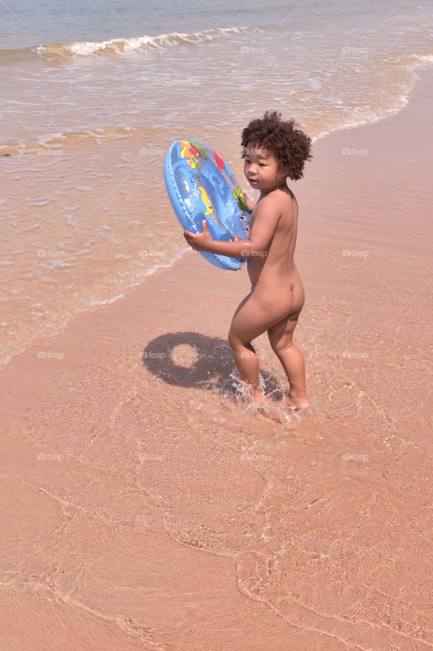 Kid on the beach . Kid on the beach 