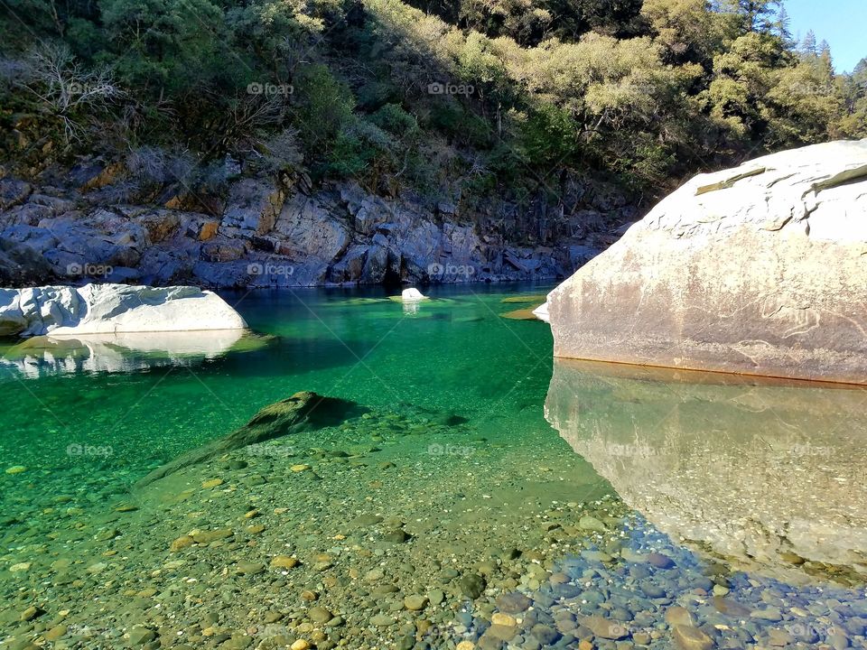 Clear swimming hole on the river