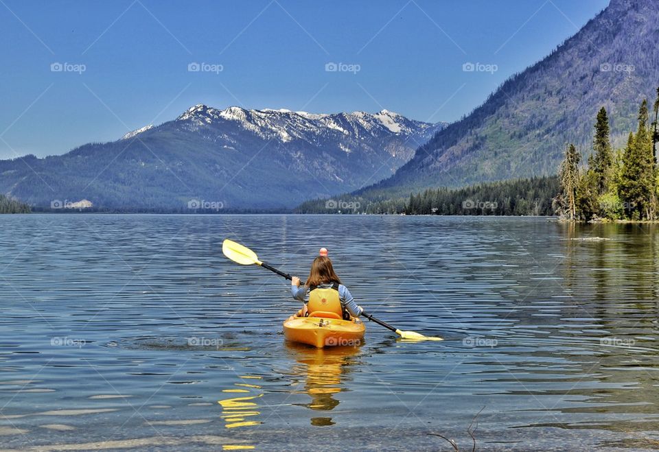 Girl paddling in water