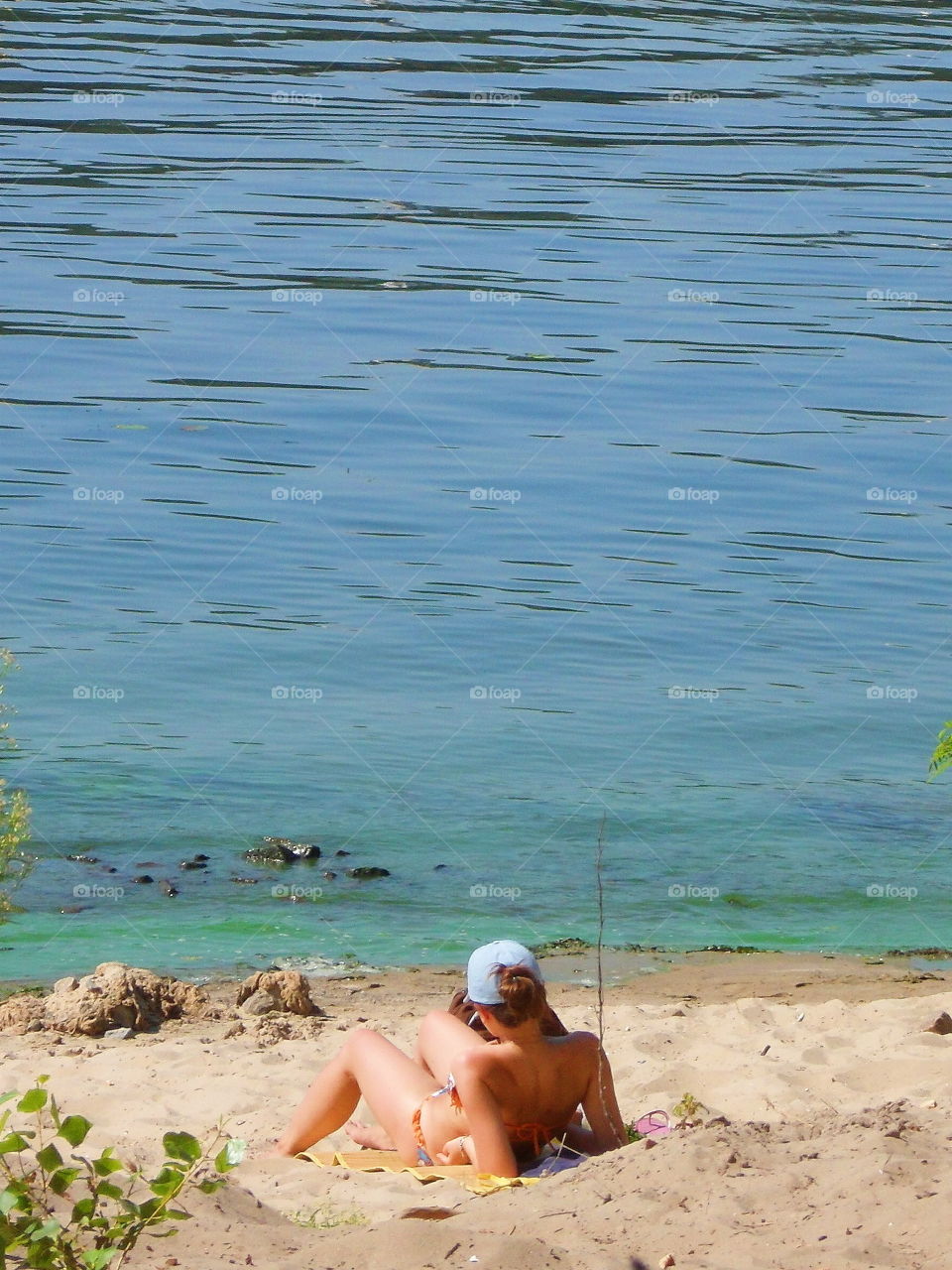 girl on the beach near the river Dnieper