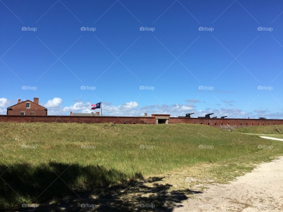 Fort clinch on Amelia island Florida.  History of early america and the soldiers that that manned the guns at the fort. Surrounded by blue ocean life is shown in all types of rooms, bunk houses, work areas etc.