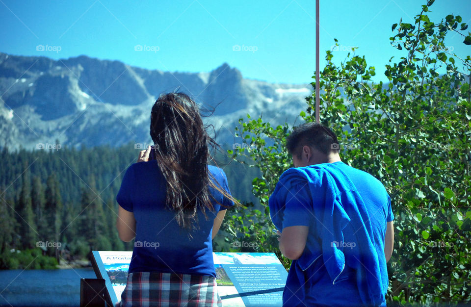 Man and woman, back, scenic view