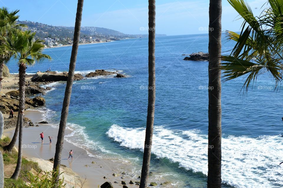 Mom with sons ar the Laguna beach 