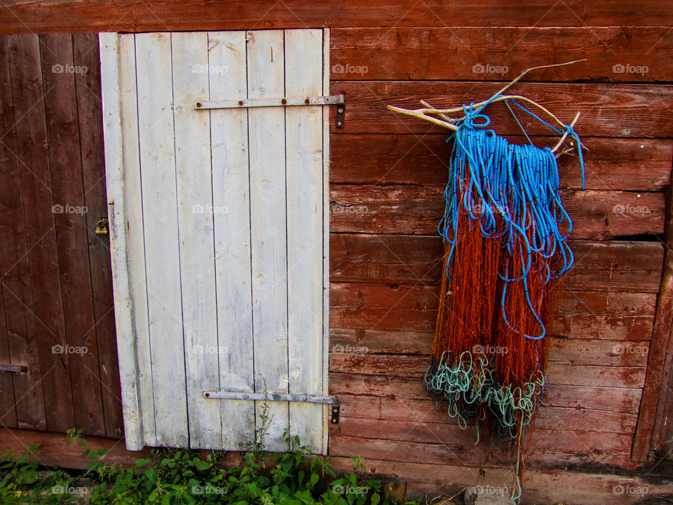 Fishing net on a wall. 