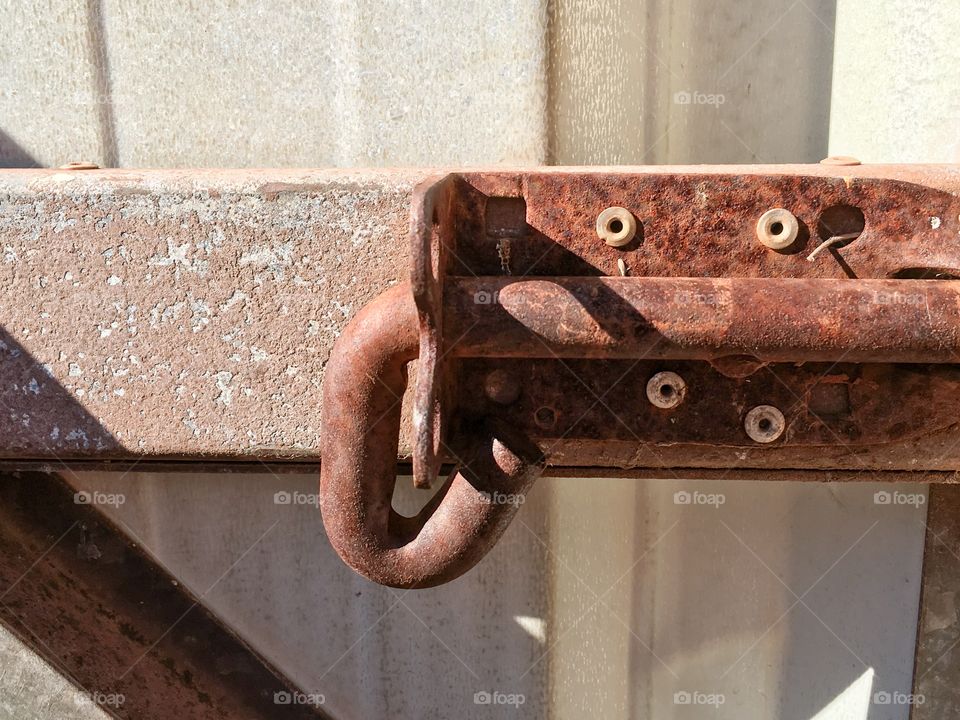 Rusted slide latch lock on tin gate rusty old 