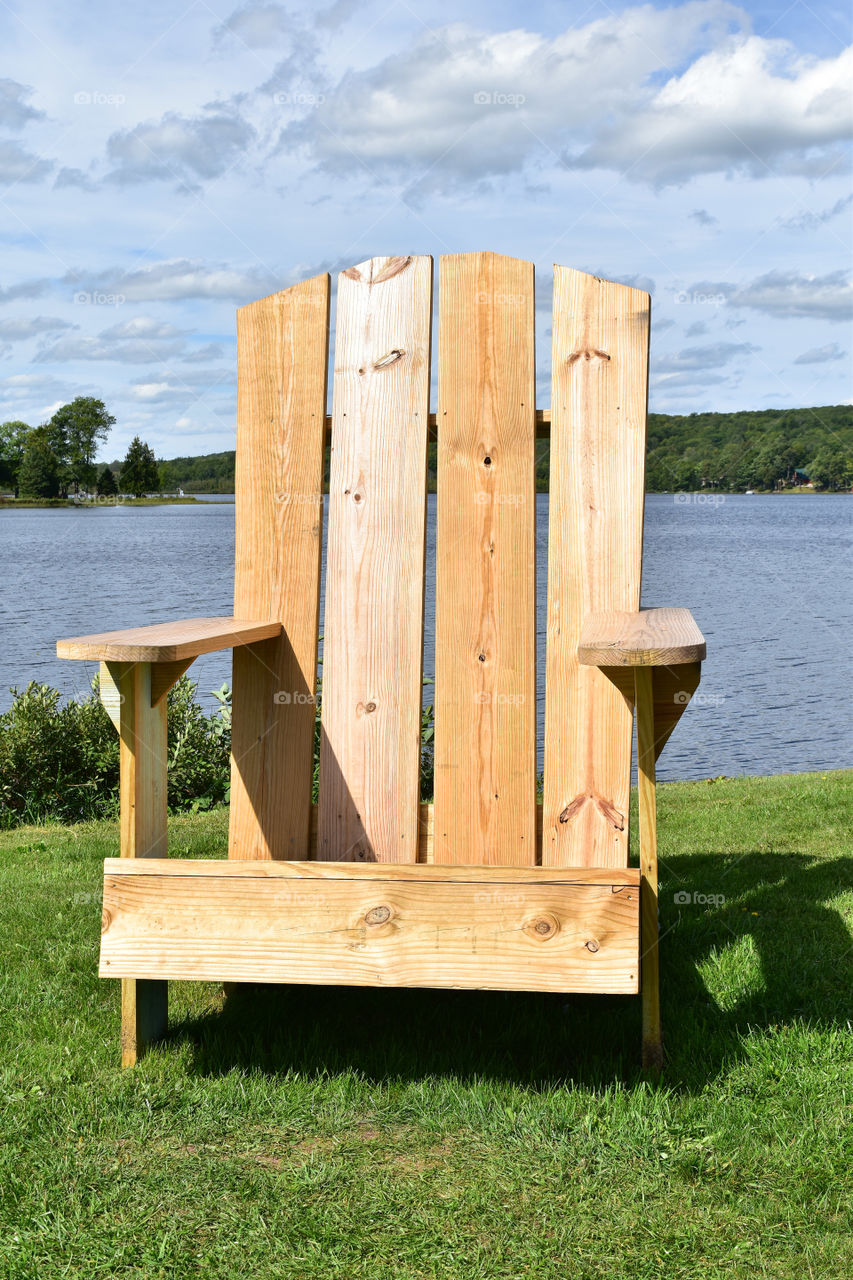 Over sized wooden chair in a park