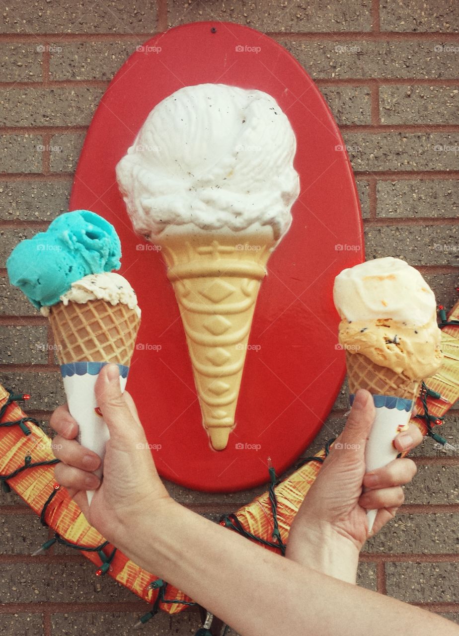 Hands Holding Ice Cream 