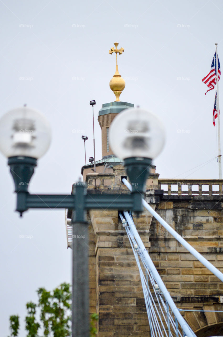 Roebling Bridge in Cincinnati with lamppost in the forefront