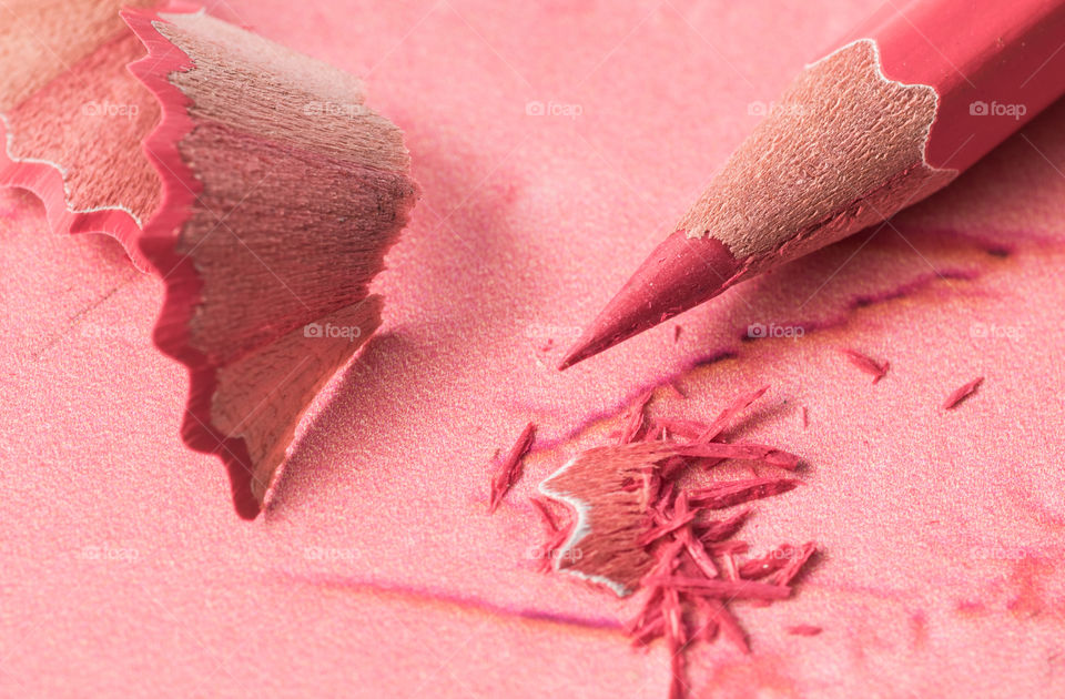 Sharpened pink colored pencil
