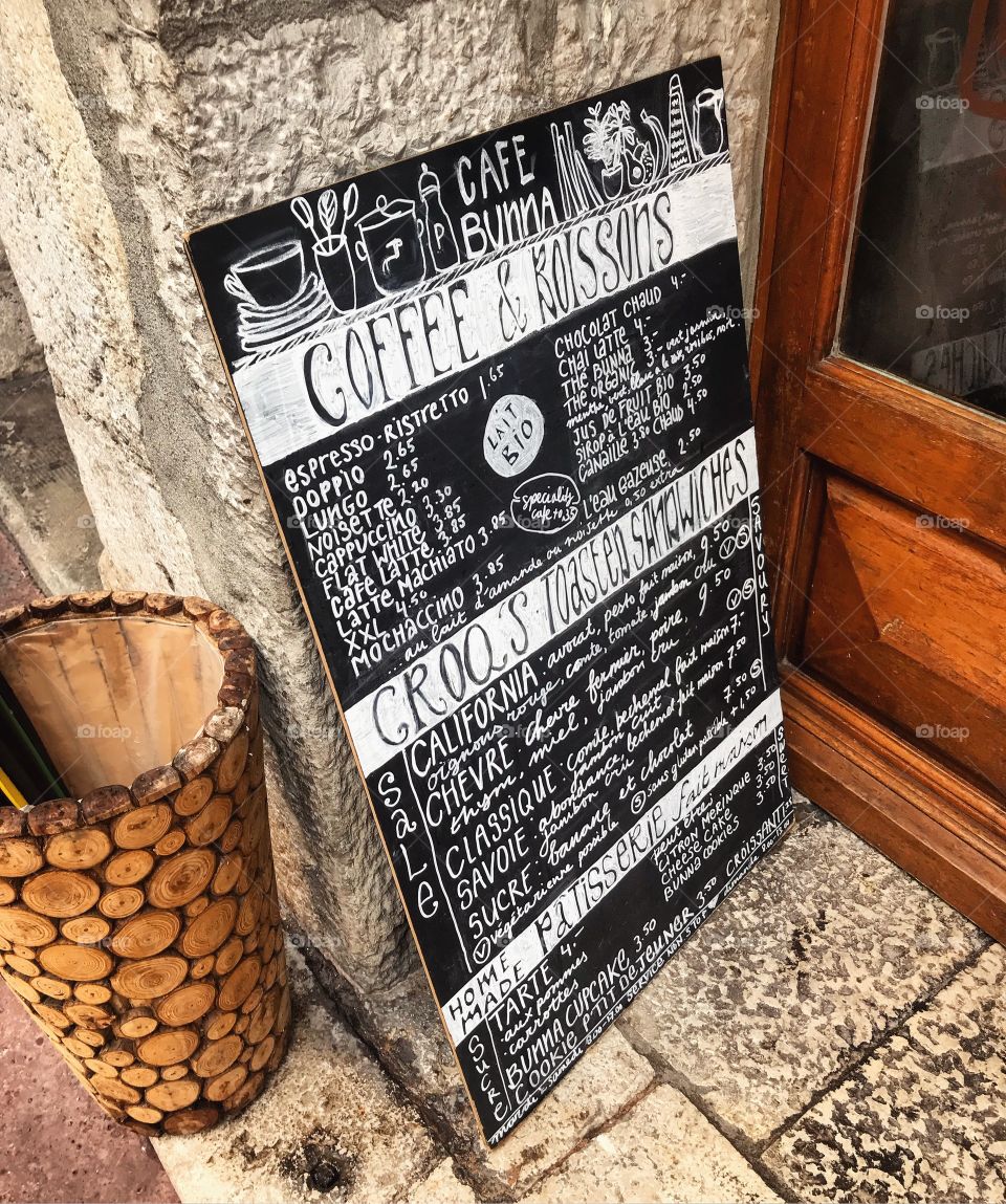 A lovely rustic French blackboard, complete with white chalk typography lettering. Taken in Annecy, France during a a European holiday.  
