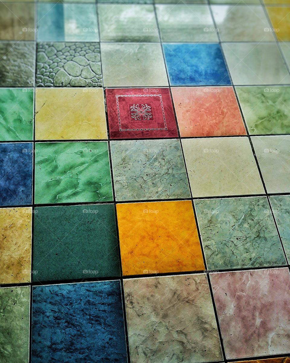 Floor tiles with unique colourful design.