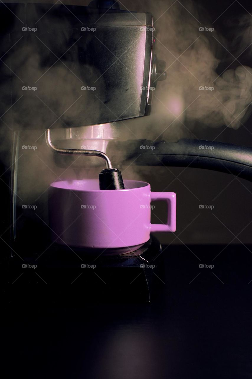 Purple coffee mug and expresso machine