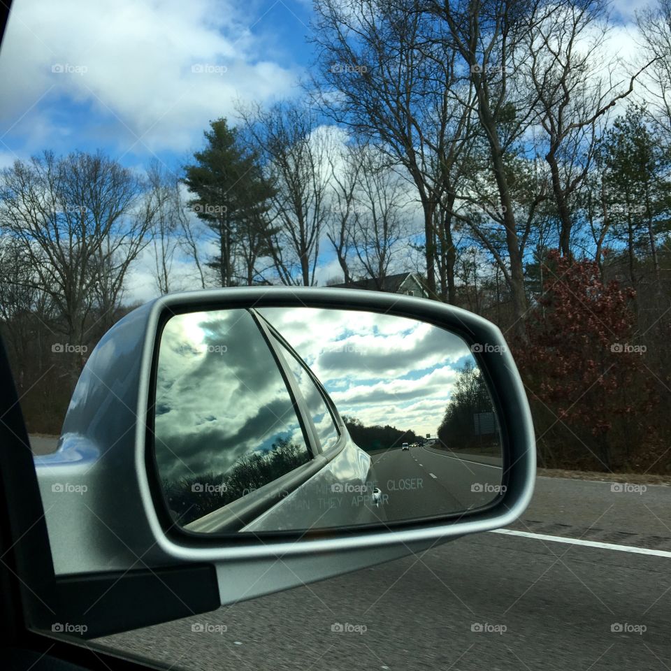 Leave The Storm Behind-Sunny Day Ahead
Looking in my rear view mirror I see the bad weather I'm leaving behind. But as I drive I can see the sun shining through the clouds up ahead of me!