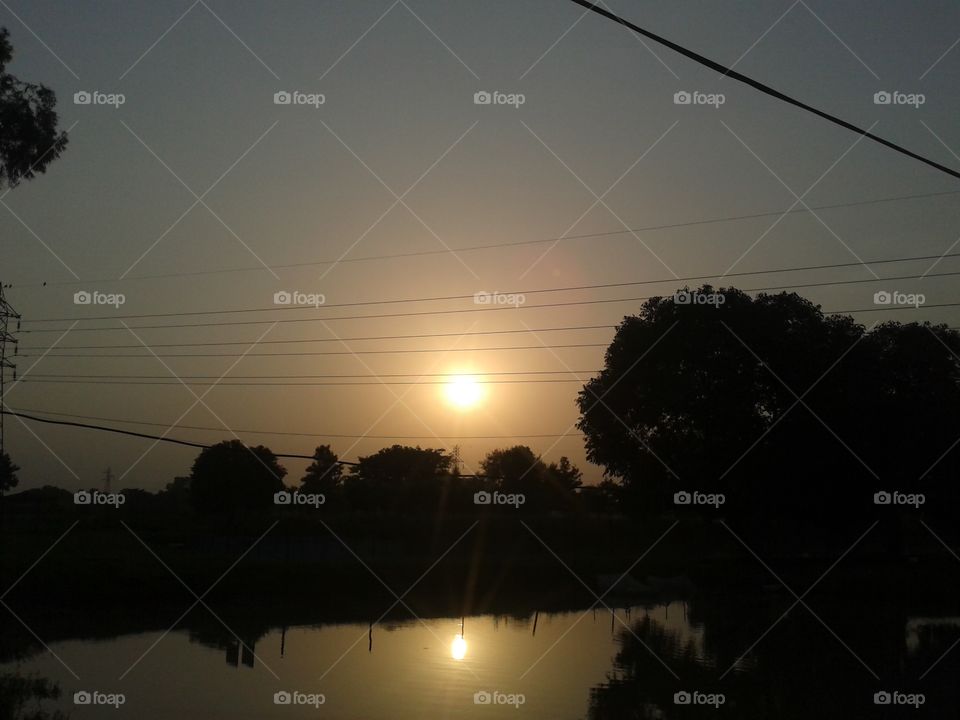 reflection of sun in water