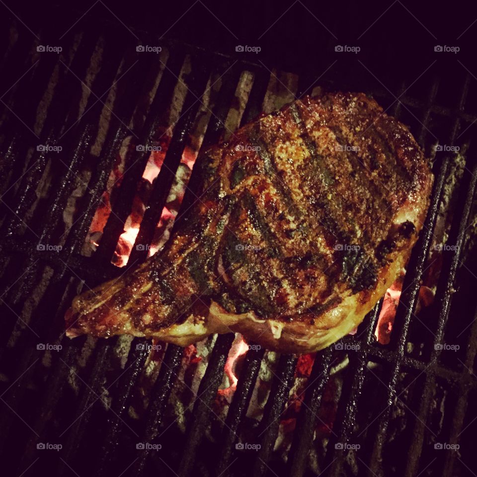 Grill Master. One warm summer night I threw a succulent ribeye on the grill!