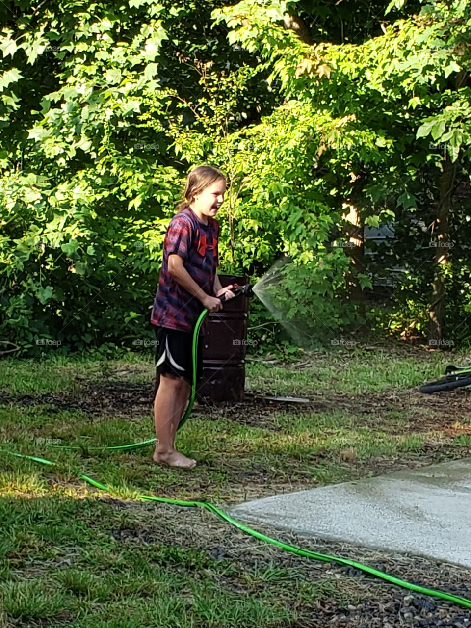 Summer time fun with the water hose