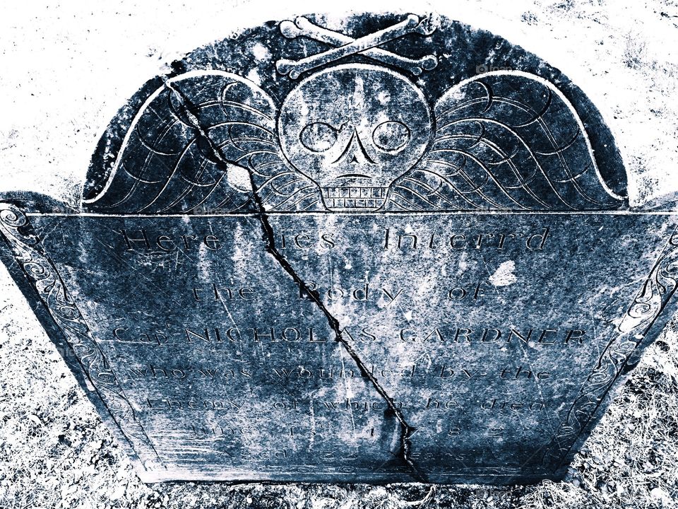 Old gravestone in historic cemetery 