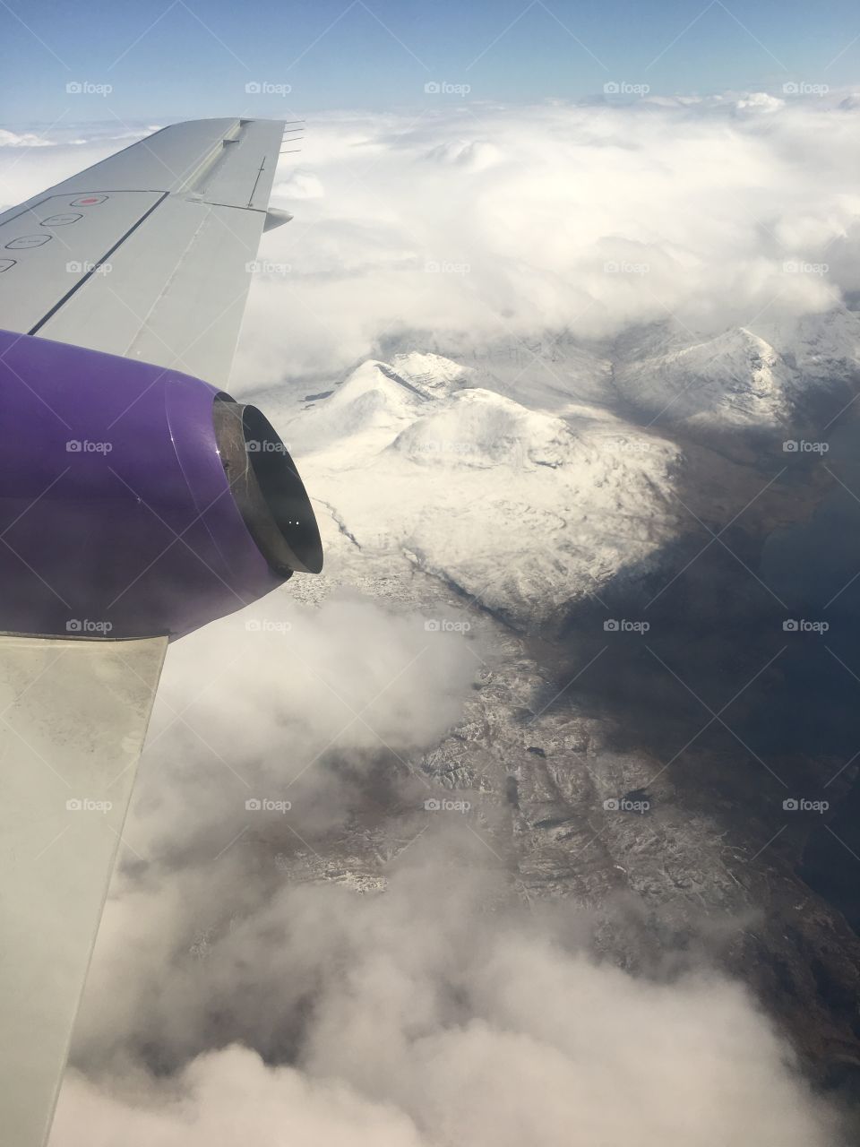 Snowy hills from plane